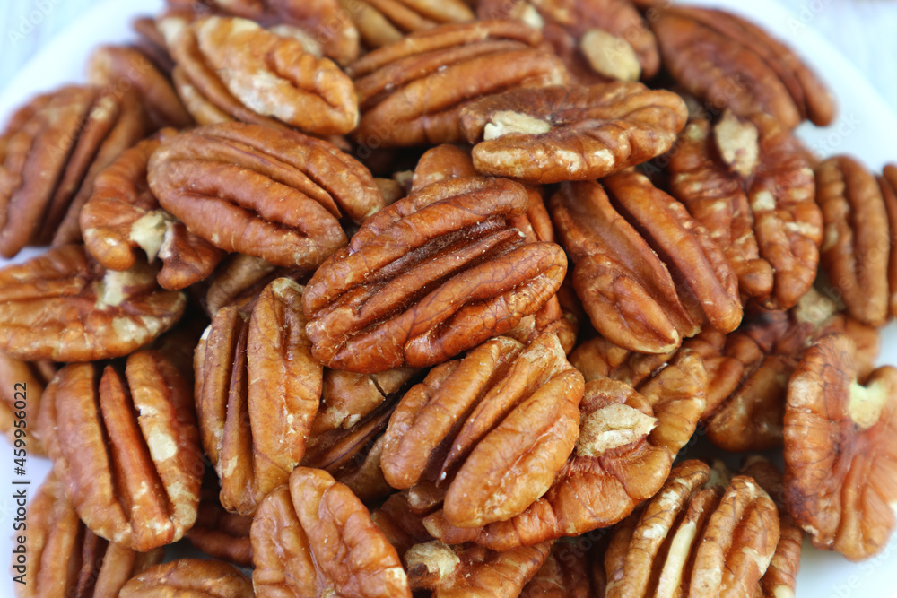 Closeup the Texture and Detail of Dried Pecan Nuts Closeup the Texture and Detail of Dried Pecan Nuts