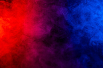 Fog in red blue neon light on black background.