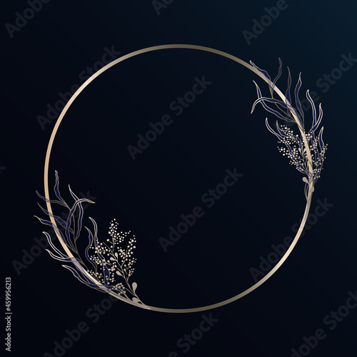 Gold round frame with leaves, branches. Against a dark background. Light and shine.