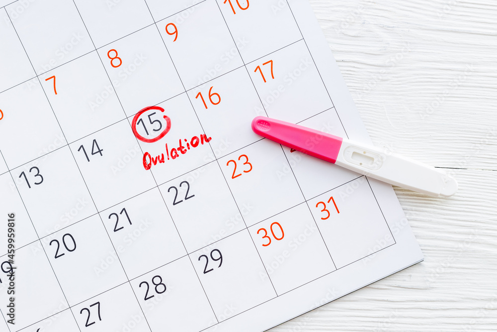 Ovulation day mark in calendar with ovulation home test Ovulation day mark in calendar with ovulation home test