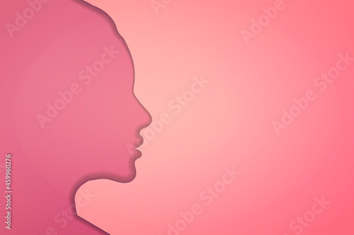 Papercut beautiful woman silhouette on pink background © EvgeniyBobrov