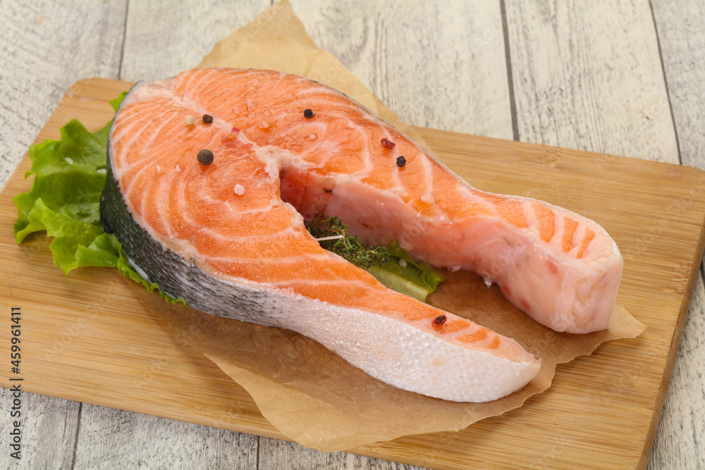 Raw salmon steak - ready for grill Raw salmon steak - ready for grill