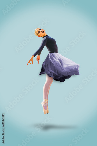 Ballet dancer jumping doing a ballet pose in the air