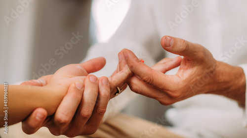 Shiatsu Hand Massage. Therapist Massaging the Heart Meridian.