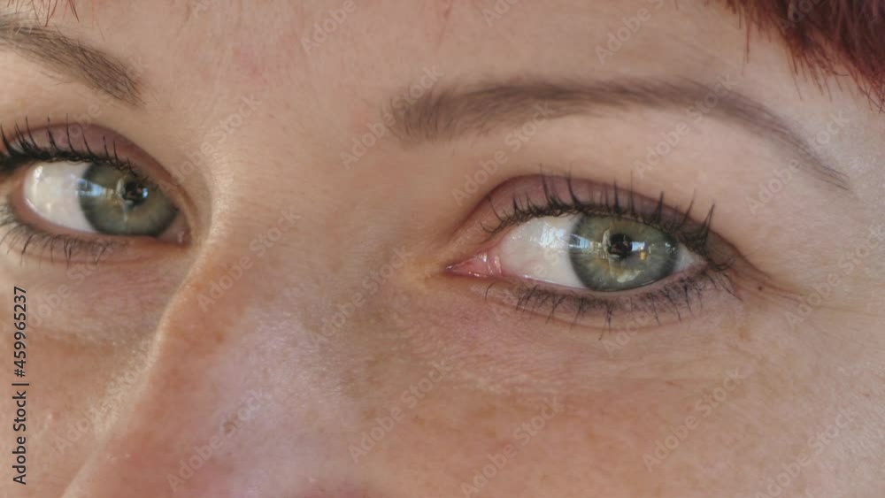 A woman with beautiful eyes. Big open eyes for a European woman. Smiling and amazed eyes A woman with beautiful eyes. Big open eyes for a European woman. Smiling and amazed eyes