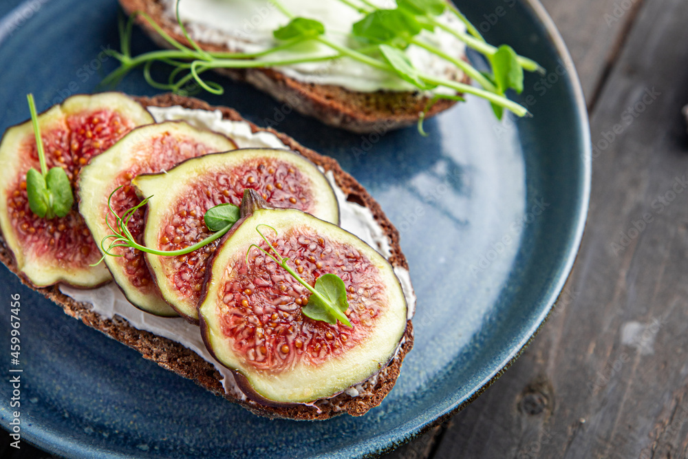 fig sandwich breakfast healthy diet fresh meal snack on the table copy space food background rustic. top view veggie vegan or vegetarian food fig sandwich breakfast healthy diet fresh meal snack on the table copy space food background rustic. top view veggie vegan or vegetarian food