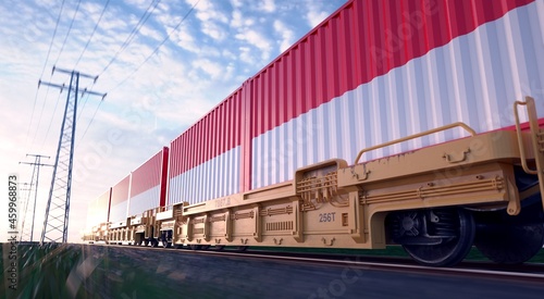 Indonesian exports. Freight train with loaded containers in motion. 