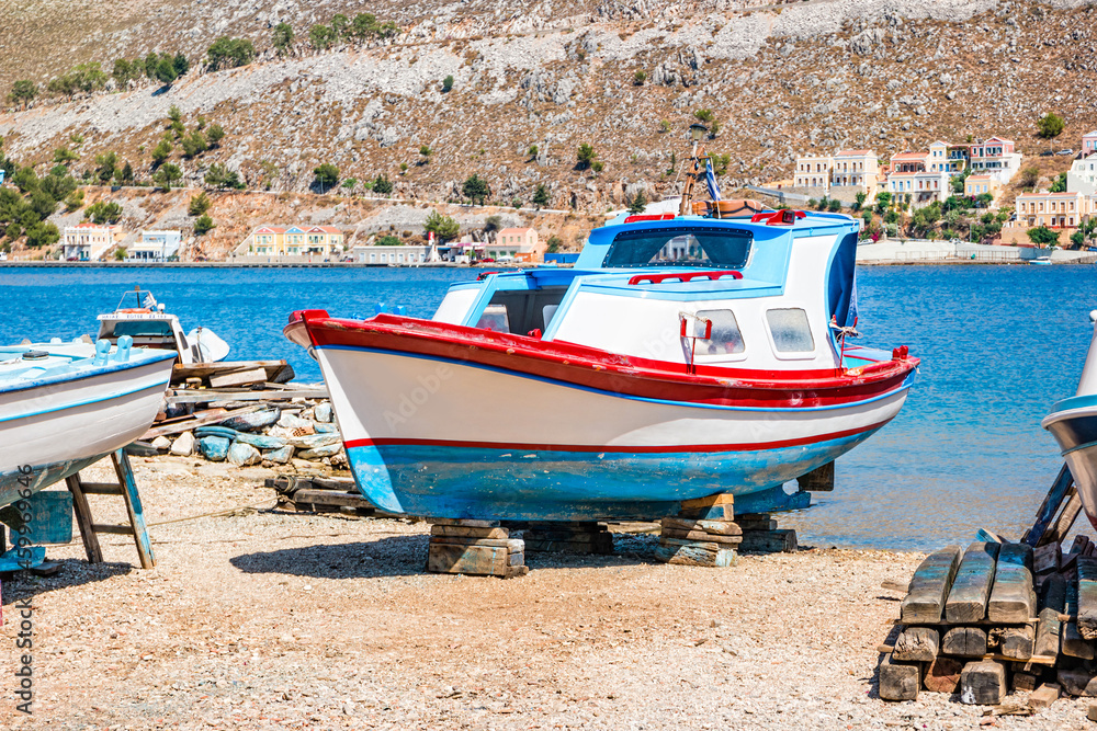 Fishing boats on land on Symi Island near Rhodes, Greece Fishing boats on land on Symi Island near Rhodes, Greece