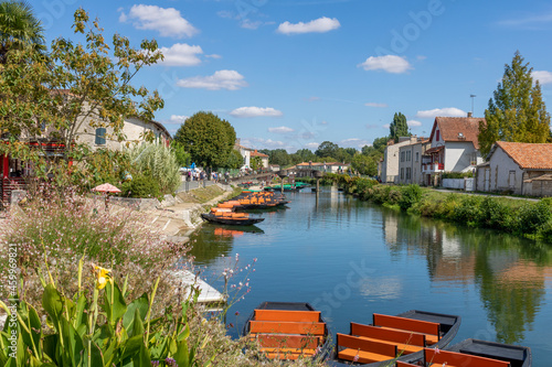 Coulon town in France. River view. Deux Sevres, New Aquitaine region. Tourism place photo