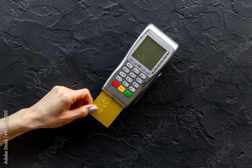 Wallpaper Mural Hand paying by card with pos payment terminal. Payment transactions concept Torontodigital.ca