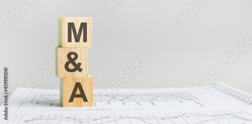 the word m and A structured query language, lined with wooden blocks photo
