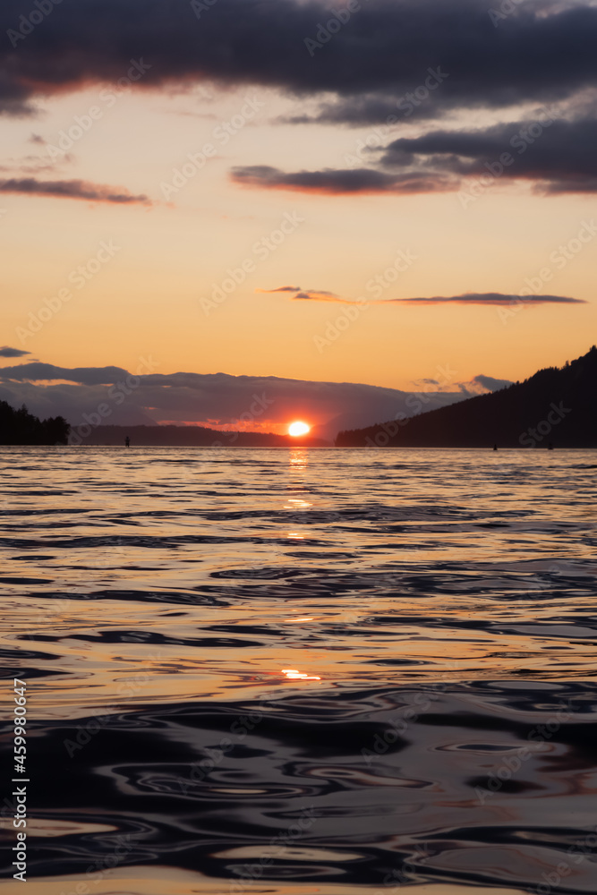 Fototapeta premium Canadian Nature Landscape View of the Gulf Islands on West Coast of Pacific Ocean. Dramatic Colorful Summer Sunset Located near Victoria, Vancouver Island, BC, Canada.