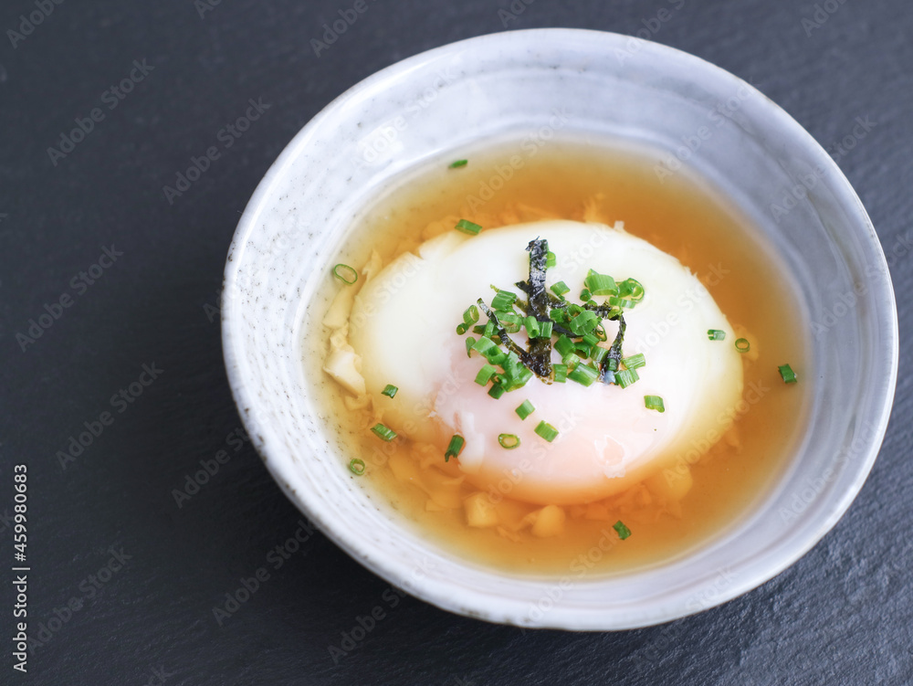 Bowls of traditional Japanese hot spring egg (Onsen Tamago) method of boiling eggs in the hot springs of Japan. Taste like soft custard, mostly famous during summer Bowls of traditional Japanese hot spring egg (Onsen Tamago) method of boiling eggs in the hot springs of Japan. Taste like soft custard, mostly famous during summer