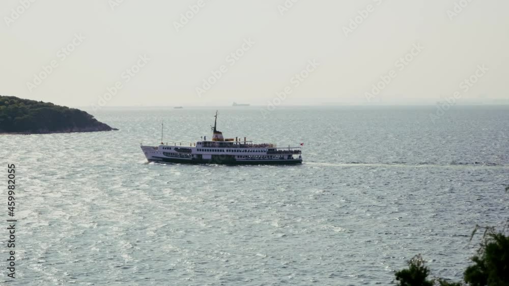 Ferry heading towards Istanbul at sunrise. Ferry heading towards Istanbul at sunrise.