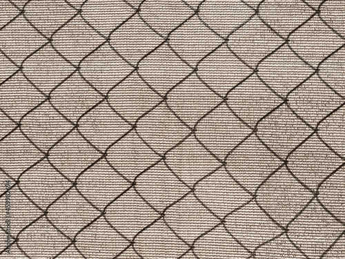 Chain-Link Shadow on Woven Privacy Screen - Background