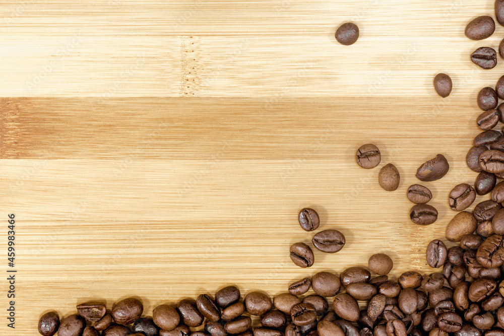 coffee beans on wooden background coffee beans on wooden background