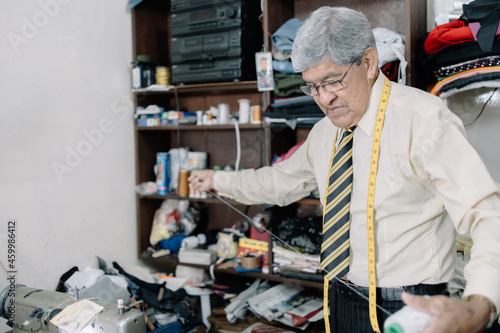 Old Mexican Tailor working on his workshop