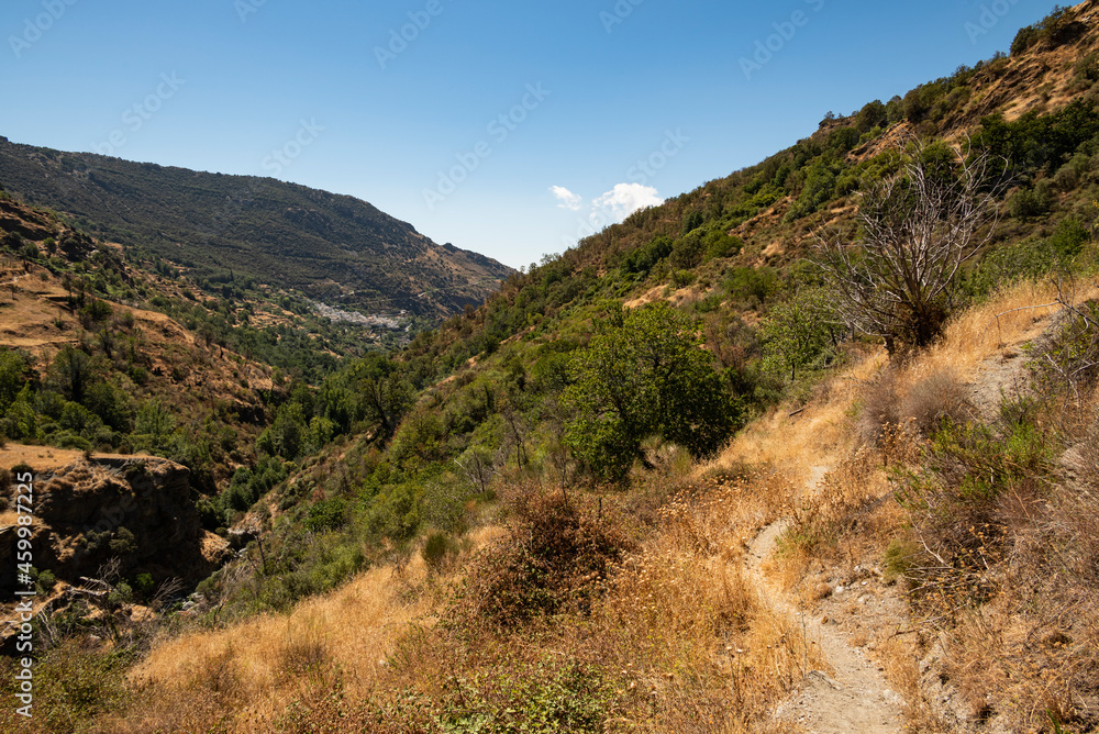 Scenic view of the beautiful Poqueira Valley from a hiking trail underneath Capileira village, Las Alpujarras, Sierra Nevada National Park, Andalusia, Spain