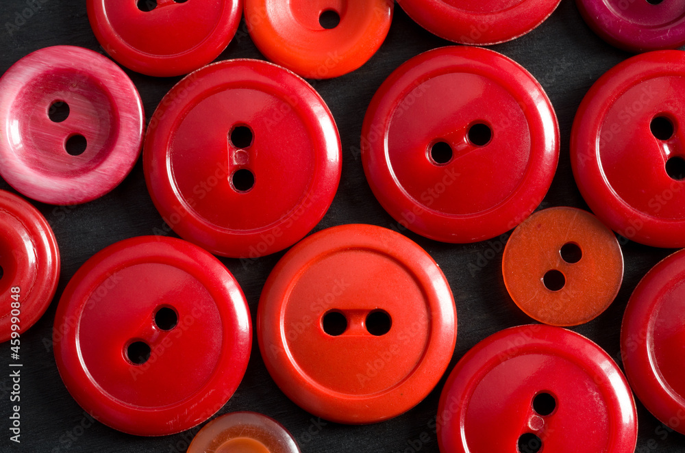 Macro Image of Red Buttons on Black Background Macro Image of Red Buttons on Black Background