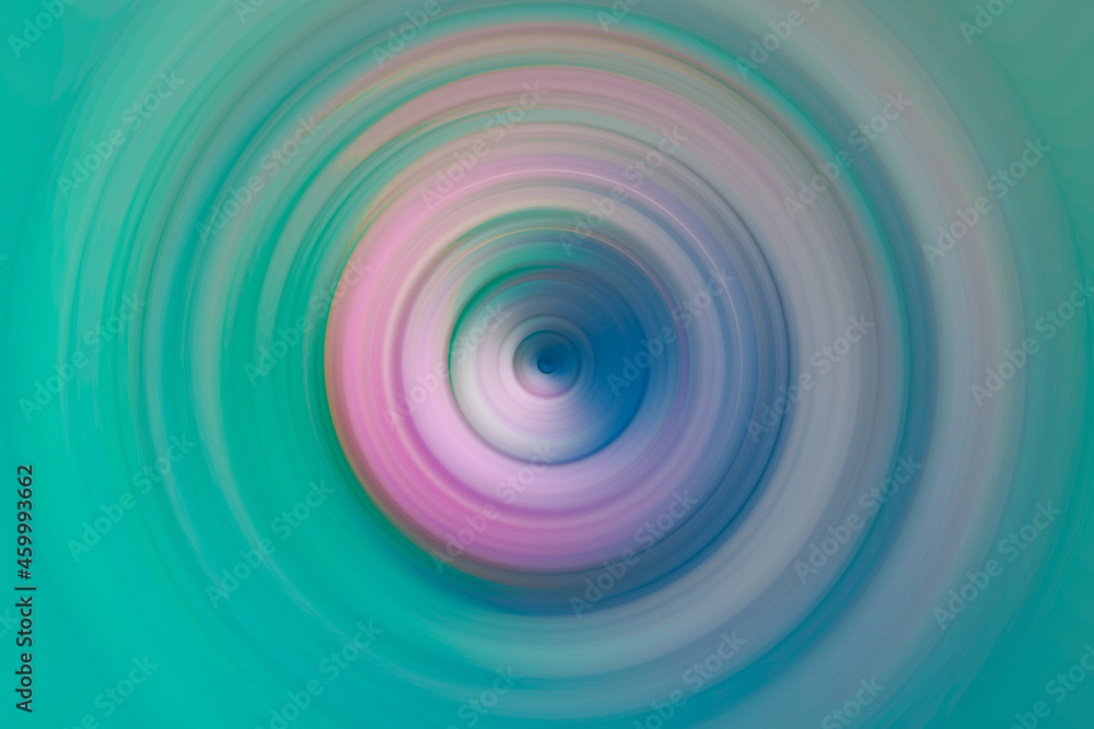 Mixed turquoise and pink circular blur