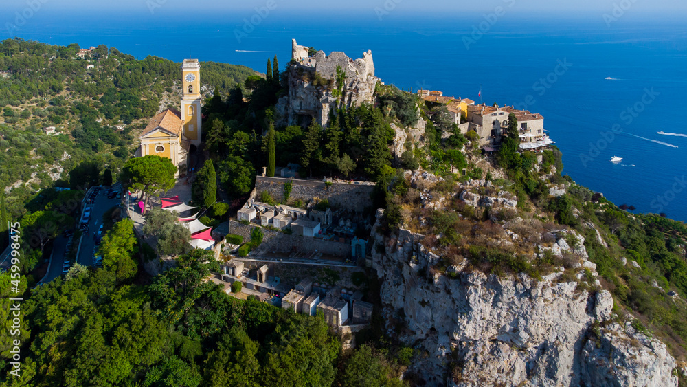 Aerial view of the church and the Exotic Gardens of Eze, a famous stone village built on a rocky overlook high above the Mediterranean Sea on the French Riviera, in the South of France
