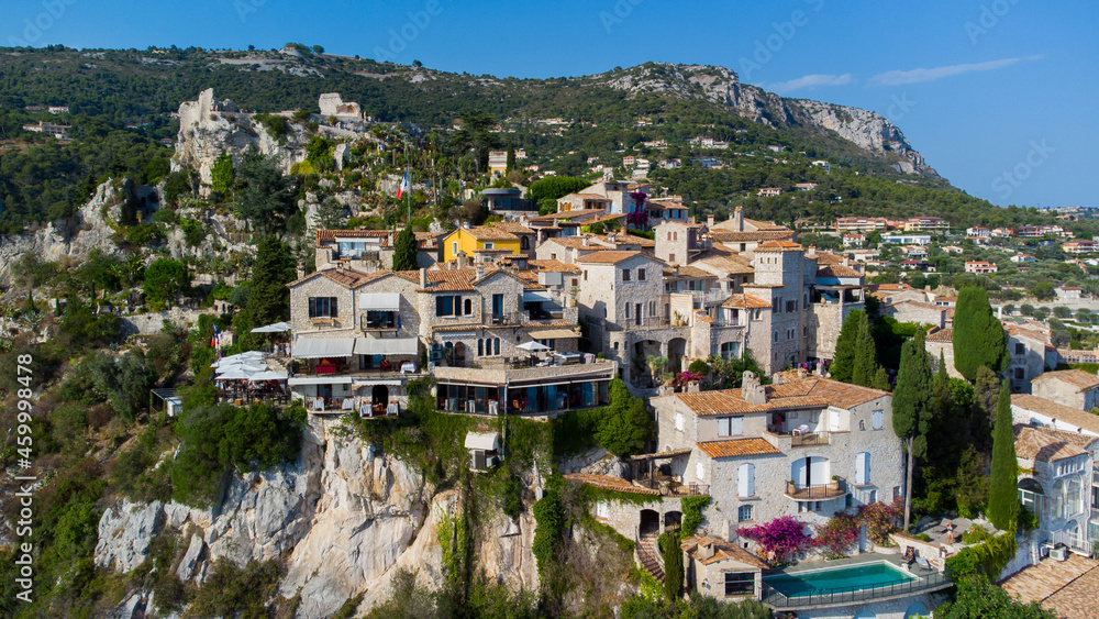 Aerial view of Eze Village, a famous stone village built on a rocky overlook high above the Mediterranean Sea on the French Riviera, in the South of France