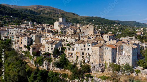 Aerial view of the medieval village of Tourrettes sur Loup in the mountains above Nice on the French Riviera, France - Old stone houses nestled on a belvedere in Provence photo