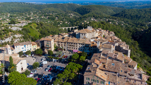 Aerial view of the medieval village of Tourrettes sur Loup in the mountains above Nice on the French Riviera, France - Old stone houses nestled on a belvedere in Provence photo