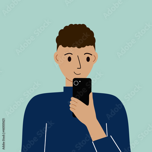 Joyful man with mobile phone, front view. Taking pictures, reading, chatting. Smartphone and internet addiction.