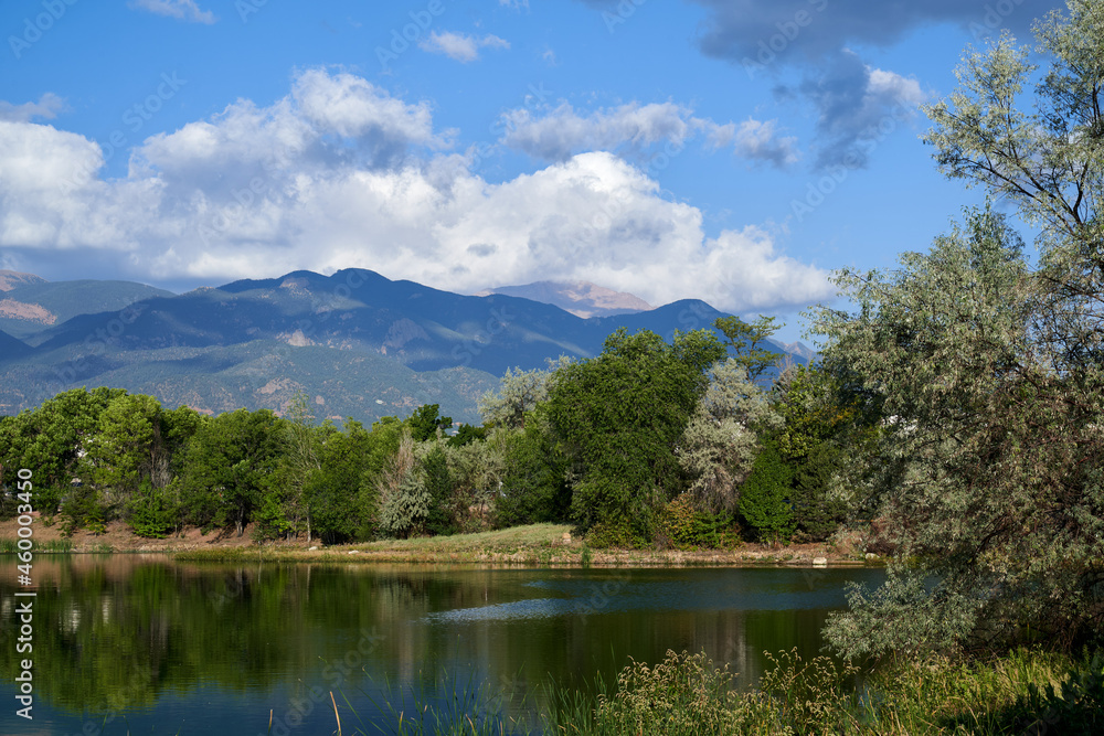 Scenic View of Reflection of Trees in Lake with Mountain Views of Colorado Springs Colorado  