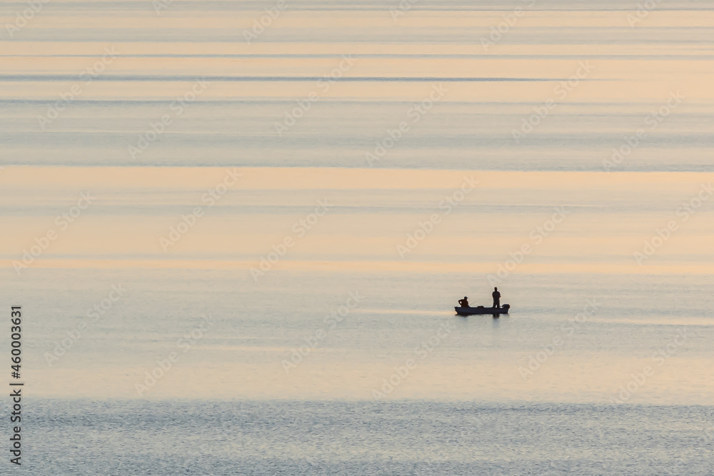 Fishermen on the Lake in the Evening