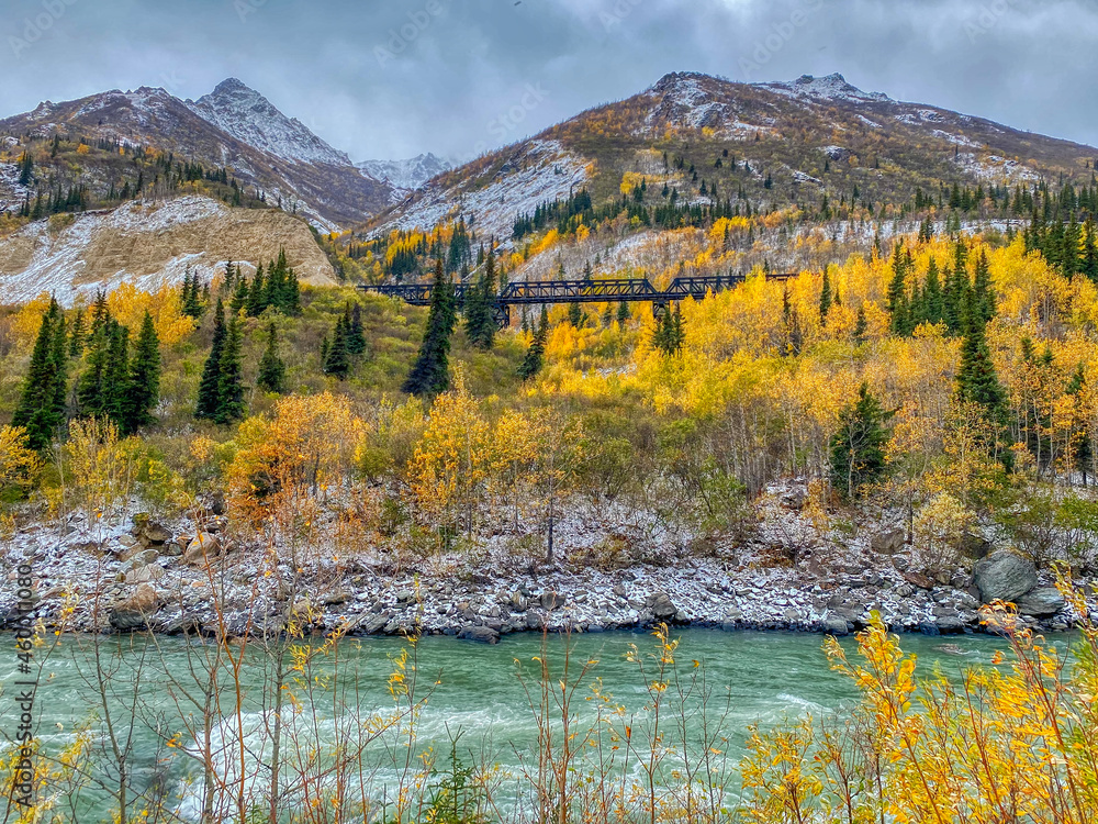 A Beautiful Scene of the River, Lightly SnowCovered Mountains, Fall