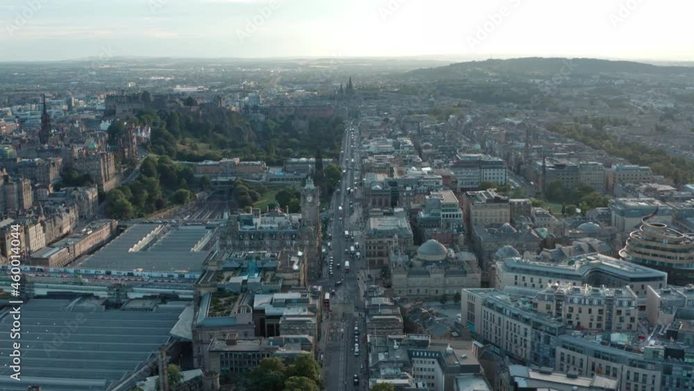 Descending drone shot over central Edinburgh Princes street at sunset Descending drone shot over central Edinburgh Princes street at sunset