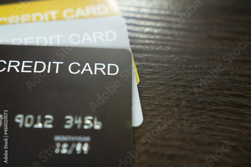 Close-up image of credit cards with selective focus.	