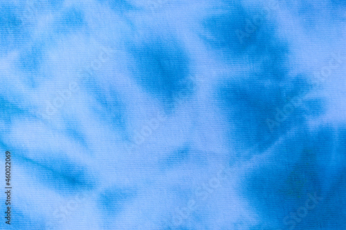 Close up tie dye fabric pattern. Hand made texture.