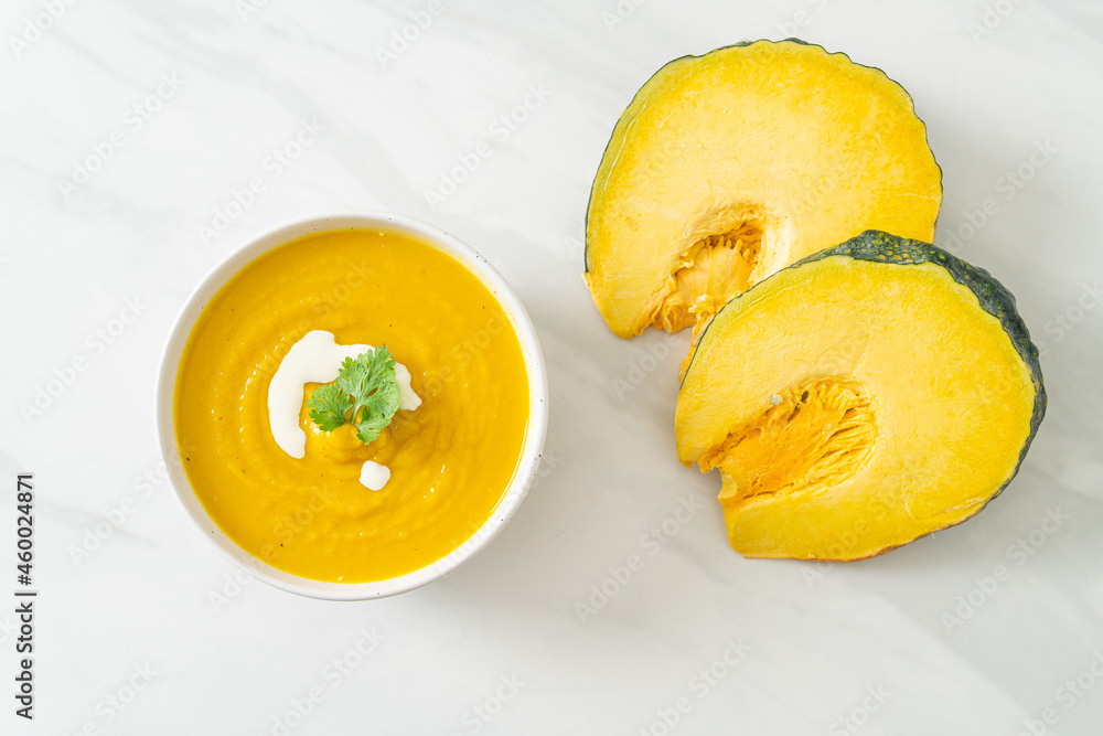 pumpkin soup in white bowl pumpkin soup in white bowl