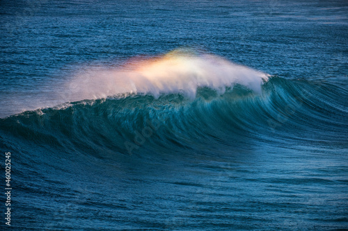 Rainbow over a wave, Sydney Australia © Gary