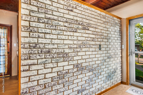 Large brink interior accent wall in home