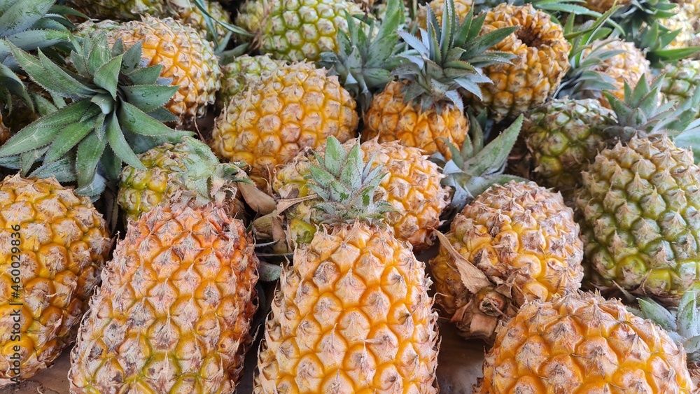 pile of pineapples at the fruit market