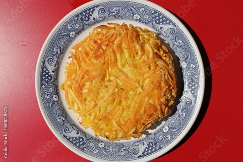 Fotografie a delicious Appenzeller rösti filled with cheese