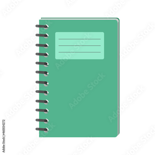Green notebook for students and pupils. Notebook on a spring isolated on a white background for design and web.