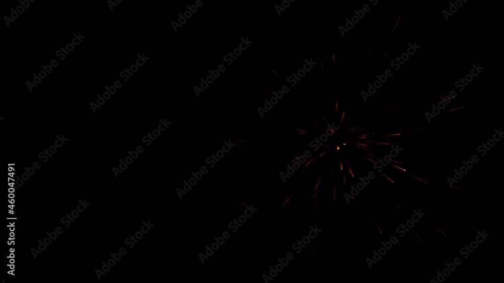 Super slow motion of fireworks explosion isolated on black background. Filmed on high speed cinema camera, 1000 fps. Super slow motion of fireworks explosion isolated on black background. Filmed on high speed cinema camera, 1000 fps.