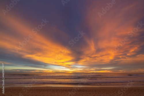 the colorful clouds are changing color in sky at sunset above the sea..Gradient color. Sky texture, abstract nature background..Sunset with strong color clouds at Karon beach Phuket.