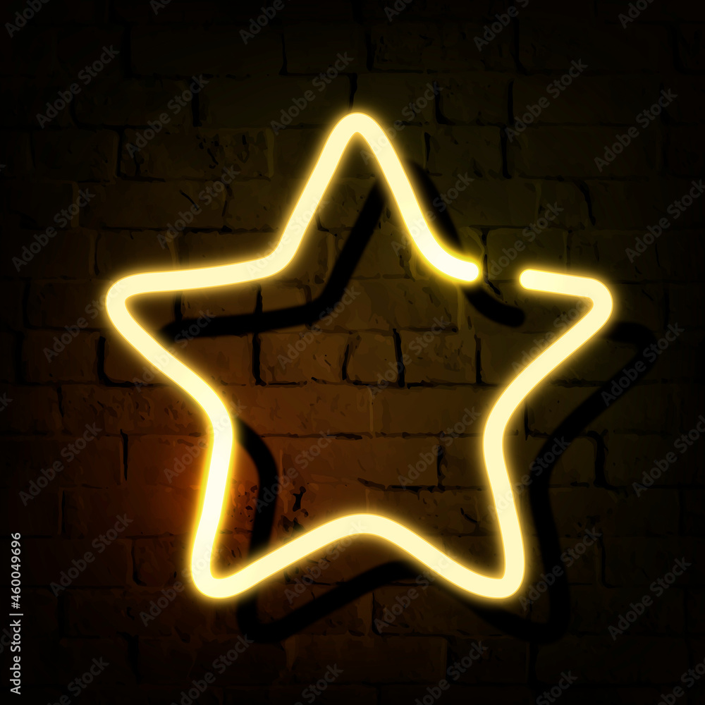 Fotografie Star neon sign on a dark brick wall vector