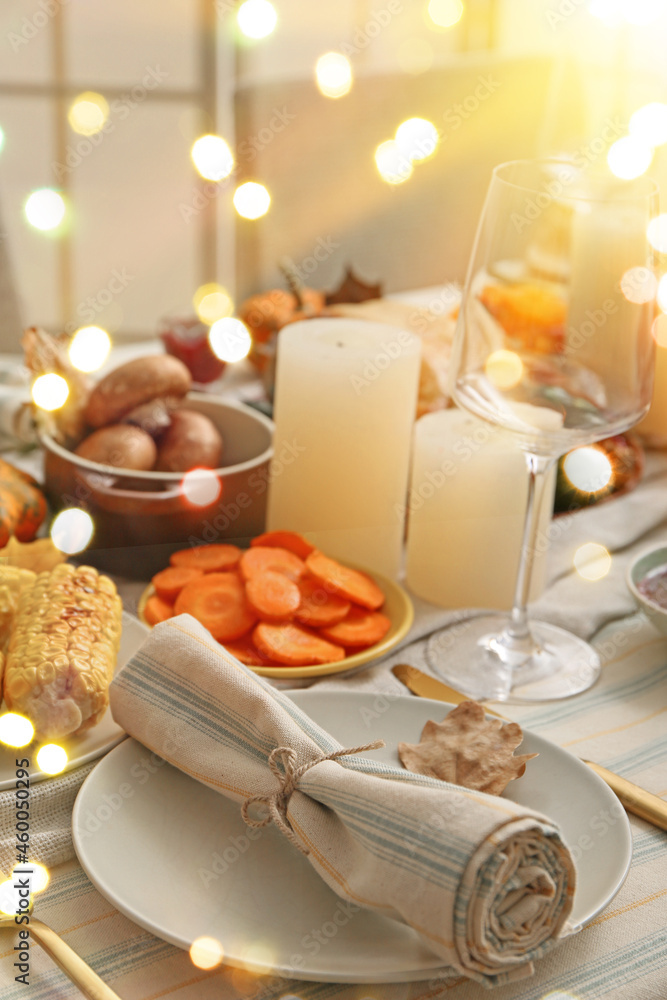 Beautiful table setting with different food for Thanksgiving Day celebration in dining room Beautiful table setting with different food for Thanksgiving Day celebration in dining room