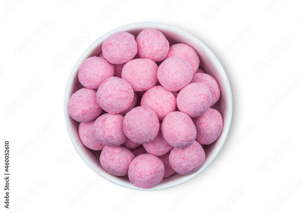 Round Sweet Strawberry Raspberry Bonbons candies in white ceramic plate on white background. Round Sweet Strawberry Raspberry Bonbons candies in white ceramic plate on white background.