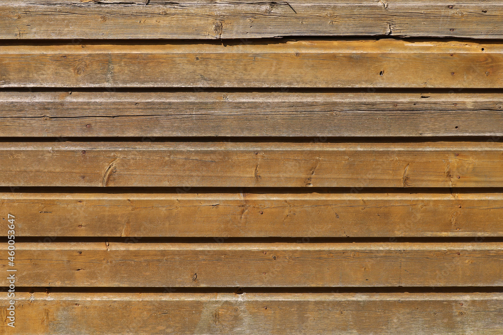 Texture of old wooden boards. Brown rustic wall