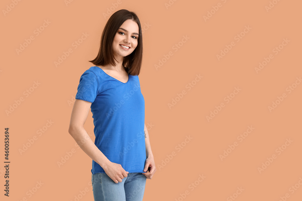 Young woman in modern t-shirt on color background Young woman in modern t-shirt on color background