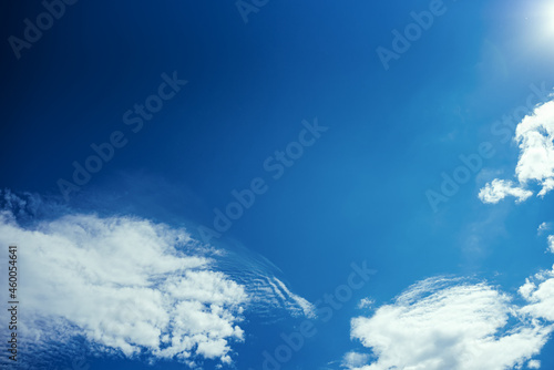 bright blue skies with soft cumulus, white cloud outdoors. Abstract background for design and project. Concept: ecology, weather