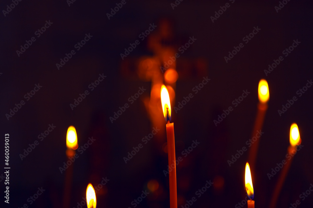 Candles in the dark . Candles Burning On The Black Background Candles in the dark . Candles Burning On The Black Background